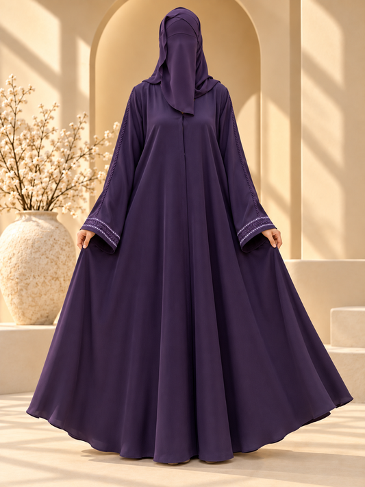 Laleh Vine Border Embroidered Abaya — front in sunlit courtyard